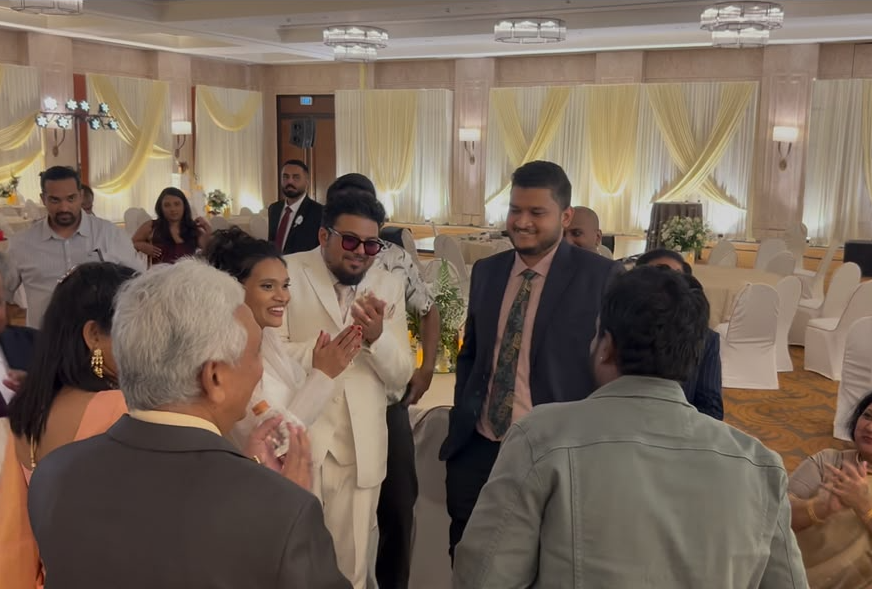 Interactive guest reaction during wedding magic performance