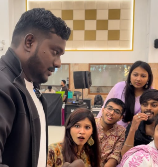 Kalai interacting with wedding VIP guests
